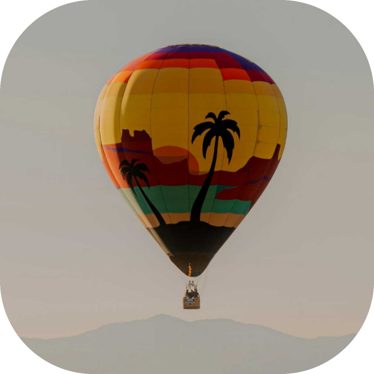Hot air balloon ride over Marrakech city at dawn - luxury travel activity
