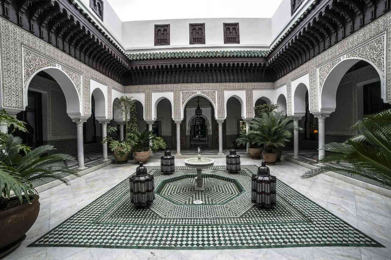 Traditional Moroccan Riad courtyard with Zellij tilework - 8 days Sahara dunes adventure luxury stay